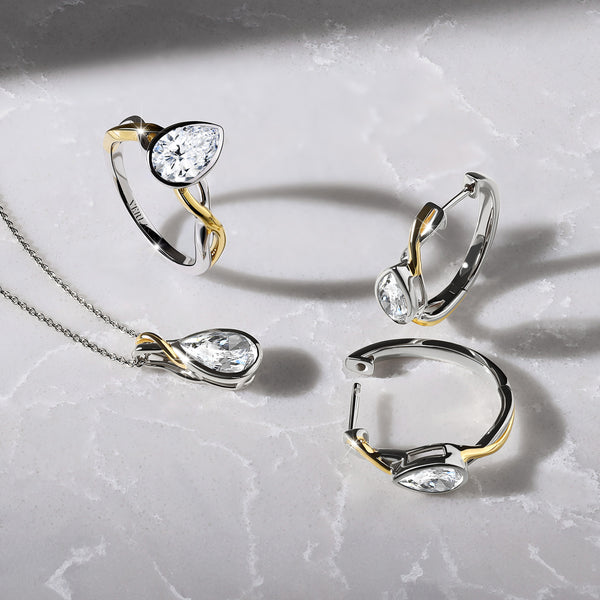 Twisted Bezel Pear Huggie Hoops